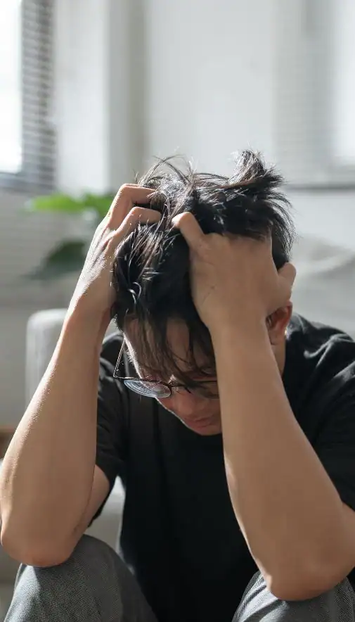 Image of upset man because of erectile dysfunction symptoms Bolton